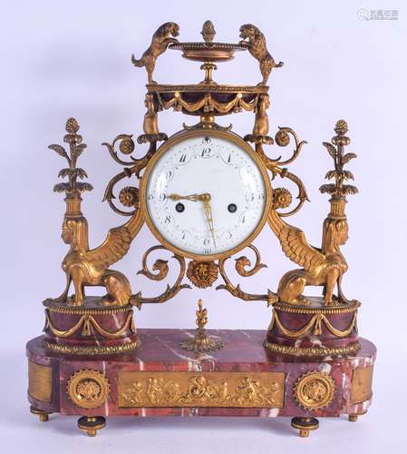 A LARGE EARLY 19TH CENTURY FRENCH BRONZE AND RED MARBLE MANTEL CLOCK the bold enamel dial painted wi