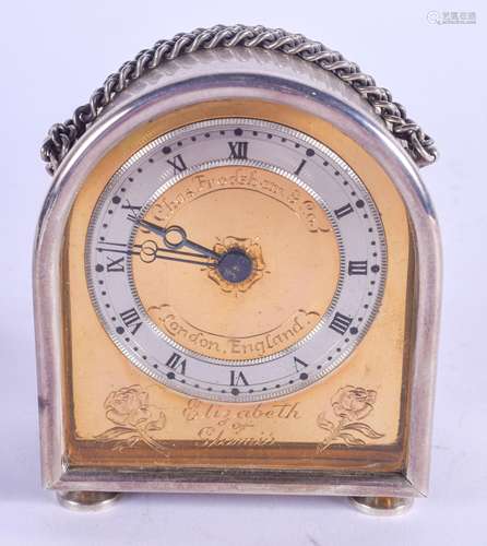 A 1960S ENGLISH SILVER CHARLES FRODSHAM TRAVELLING CLOCK Elizabeth of Glamis, with gilt dial. London