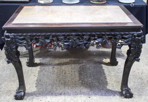 A LARGE 19TH CENTURY CHINESE HONGMU HARDWOOD MARBLE INSET CONSOLE TABLE Qing, with bold mask head su