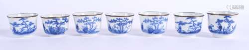 A SET OF SEVEN 18TH/19TH CENTURY CHINESE BLUE AND WHITE TEABOWLS Qing, painted with fisherman and ca