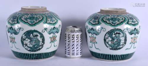 A PAIR OF 19TH CENTURY CHINESE FAMILLE VERTE PORCELAIN GINGER JARS Qing, painted with dragon roundel