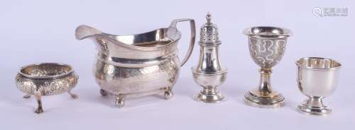 A REGENCY SILVER SAUCEBOAT together with other silver ware. 250 grams. (5)