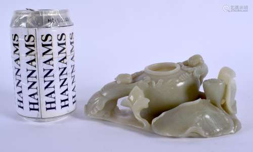 A 19TH CENTURY CHINESE CARVED GREEN JADE BRUSH WASHER Qing, modelled as two boys pulling at an open