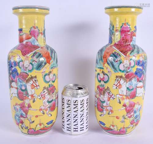 A RARE PAIR OF 19TH CENTURY CHINESE FAMILLE JAUNE ROULEAU VASES Qing, enamelled with figures on hors