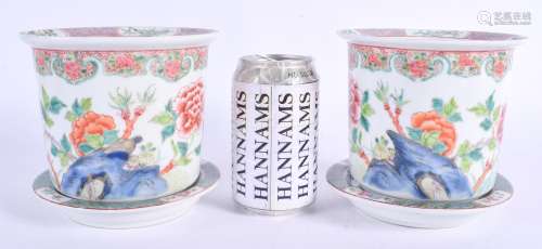 A PAIR OF 19TH CENTURY CHINESE FAMILLE ROSE JARDINIERES ON STANDS Qing, painted with flowers in the