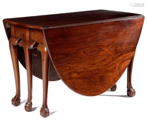 A MAHOGANY DINING TABLE IN GEORGE II IRISH STYLE 1…