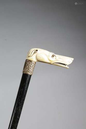 Λ AN EARLY 19TH CENTURY IVORY HANDLED WALKING CANE…