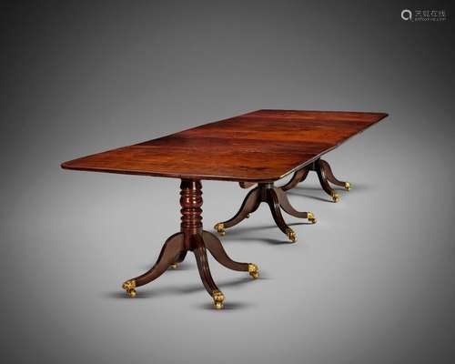 A REGENCY MAHOGANY TRIPLE PILLAR DINING TABLE C.18…