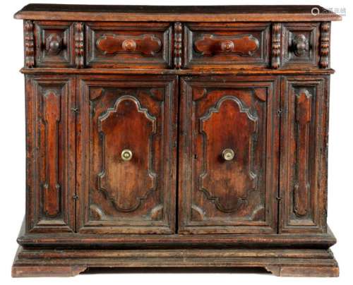 AN ITALIAN BAROQUE WALNUT CREDENZA TUSCANY, 17TH C…