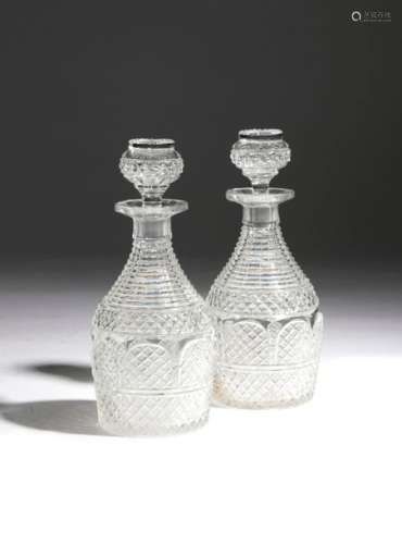A PAIR OF LATE REGENCY CUT GLASS DECANTERS C.1820 …