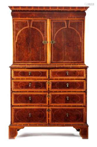 A WILLIAM AND MARY YEW AND BURR YEW CABINET ON CHE…