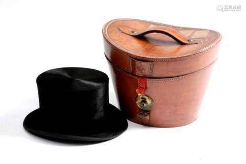 A SWEDISH BLACK SILK TOP HAT BY PAUL BERGSTROMS, S…