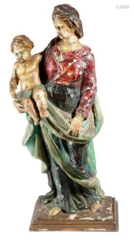 A CARVED WOOD AND POLYCHROME GROUP OF THE VIRGIN A…