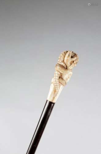 Λ A JAPANESE IVORY HANDLED WALKING CANE MEIJI 1868…