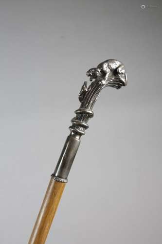 A SILVERED METAL HANDLED WALKING CANE C.1920 the h…