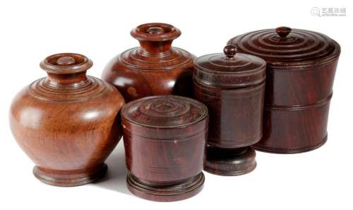 FIVE TREEN JARS AND COVERS 19TH CENTURY comprising…