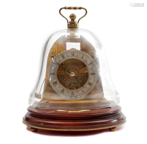 AN UNUSUAL BRASS AND GLASS SHIP'S BELL CLOCK BY MA…