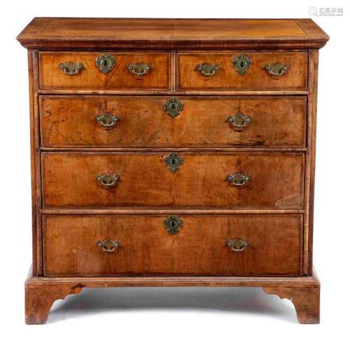 A GEORGE I WALNUT CHEST C.1715 the quarter veneere…