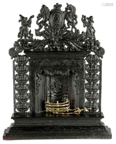 A VICTORIAN CAST IRON MINIATURE FIREPLACE MID 19TH…