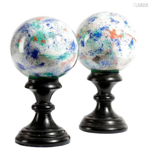 A PAIR OF GLASS SPHERES EARLY TO MID 20TH CENTURY …