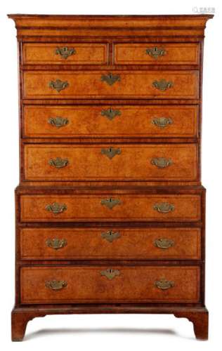 A GEORGE II BURR ELM AND WALNUT CHEST ON CHEST C.1…