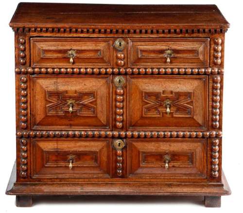 A WILLIAM AND MARY OAK CHEST C.1690 the top with a…
