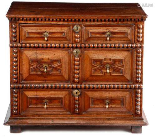 A WILLIAM AND MARY OAK CHEST C.1690 the top with a…