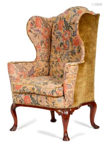 A GEORGE I WALNUT WING ARMCHAIR C.1725 later uphol…