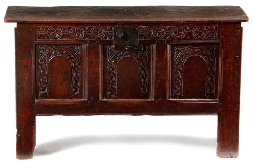 A CHARLES II BOARDED OAK COFFER C.1660 of six plan…