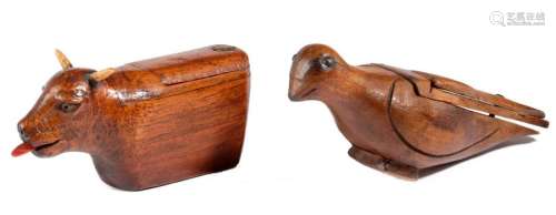 A RARE TREEN COW SNUFF BOX 19TH CENTURY with a red…