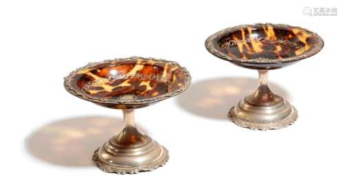 Λ A PAIR OF GEORGE V TORTOISESHELL AND SILVER TAZZ…