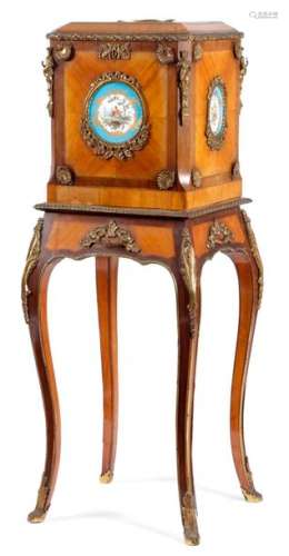 A FRENCH KINGWOOD AND PORCELAIN MOUNTED JEWEL CASK…