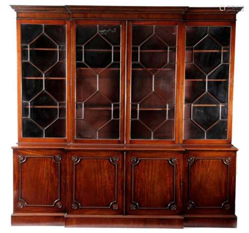 A GEORGE III MAHOGANY LIBRARY BREAKFRONT BOOKCASE …