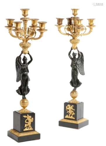A PAIR OF FRENCH 'EMPIRE' GILT AND PATINATED BRONZ…