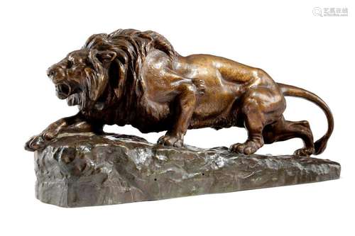 AN ANIMALIER BRONZE MODEL OF A STALKING LION 'LION…