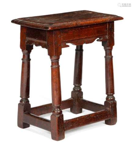 A CHARLES I OAK JOINT STOOL C.1630 the top with a …