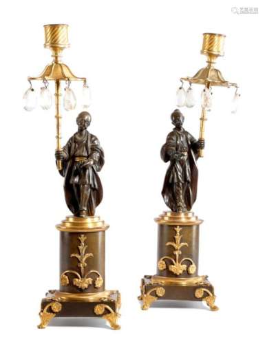 A PAIR OF REGENCY GILT AND PATINATED BRONZE FIGURA…