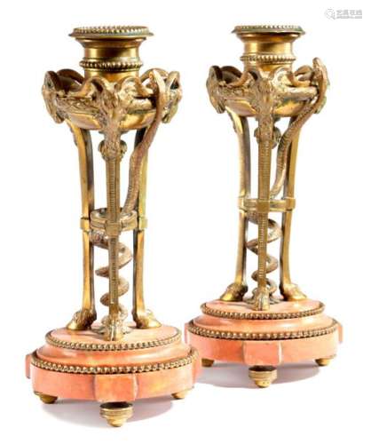 A PAIR OF FRENCH ORMOLU CANDLESTICKS IN LOUIS XVI …