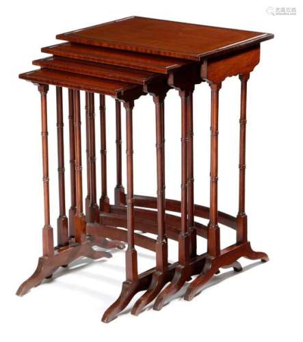 A QUARTETTO NEST OF MAHOGANY OCCASIONAL TABLES IN …