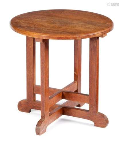 AN OAK OCCASIONAL TABLE IN ARTS AND CRAFTS STYLE I…