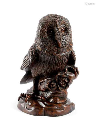 A CARVED WOOD OWL TOBACCO JAR with glass eyes and …