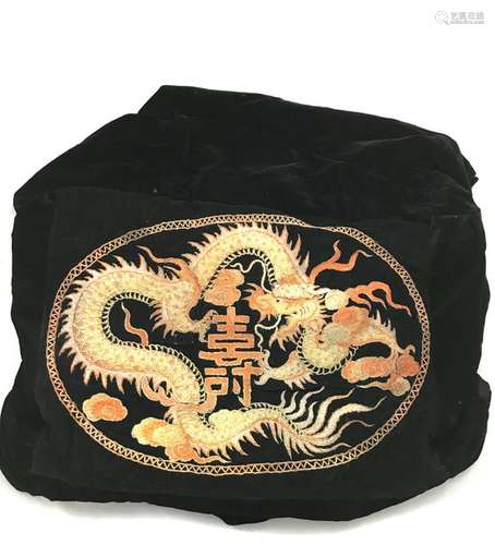 Velvet textile element embroidered with a decoration of dragons in pursuit of the sacred pearl South China. Indochina. Height 42 cm, Width 52 cm.