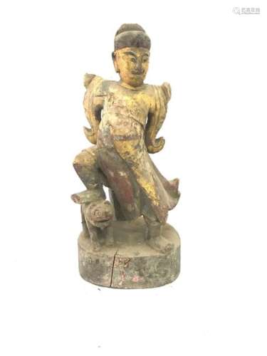 Polychrome carved wooden subject representing a character in costume with his foot resting on the back of a cat. Height: 25.6 cm. Width : 12,7 cm. Depth : 9 cm. Wear and tear and small accidents.