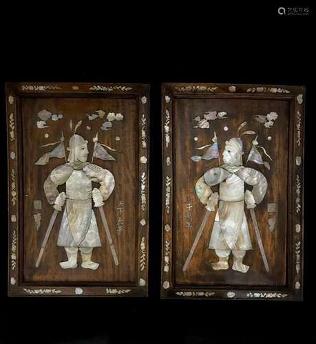 Two rosewood panels with mother-of-pearl inlays, representing warriors with auspicious inscriptions. Small lacks and accidents. Height 42 cm, width 28 cm.