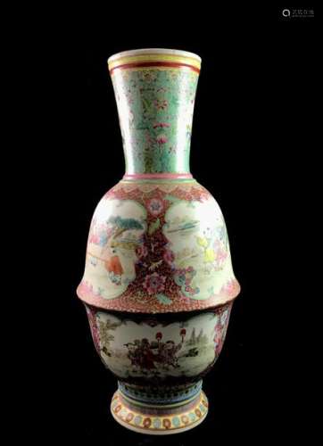 Large porcelain vase decorated with rose family enamels on a red background strewn with lotus, foliage and blooming flowers, cartridges surrounded by bats representing children playing . China, modern work. The neck and base are decorated with a frieze of Ruyi. Height. 59 cm. An accident on the lip of the collar, glued.