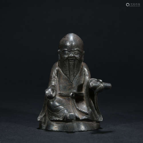 A silver figure