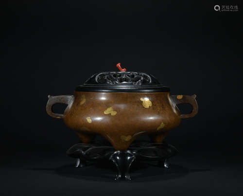 A sprinkle gold bronze incense burner