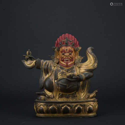 A gilt bronze statue of guru