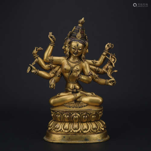 A gilt-bronze figure of Chakrasamvara
