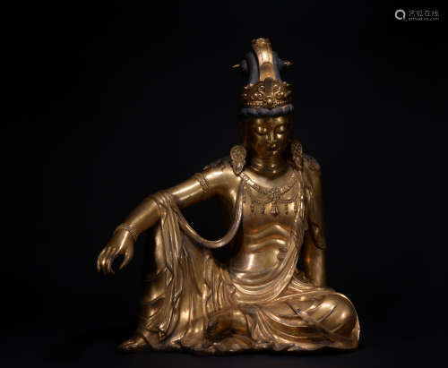 A gilt bronze statue of free Gwan Yin
